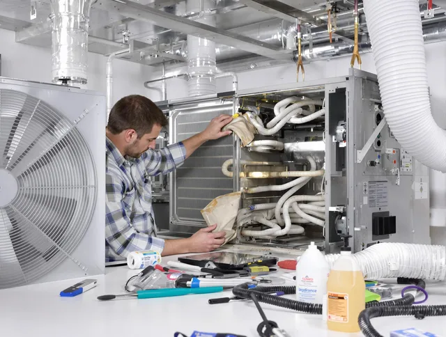 Smithfield Air Duct Cleaning specialist performing precision AC coil cleaning in Smithfield