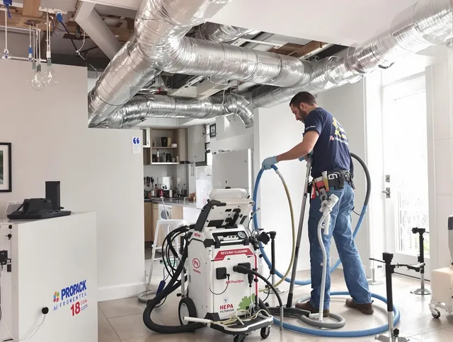 Smithfield Air Duct Cleaning technician performing advanced pure duct cleaning with specialized equipment in Smithfield